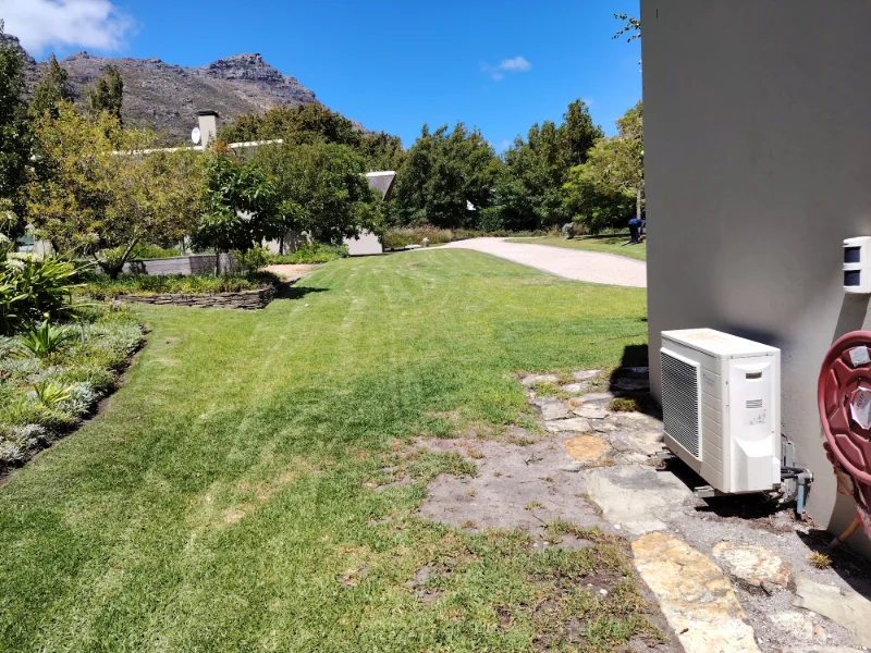 Residential HVAC outdoor compressor installation